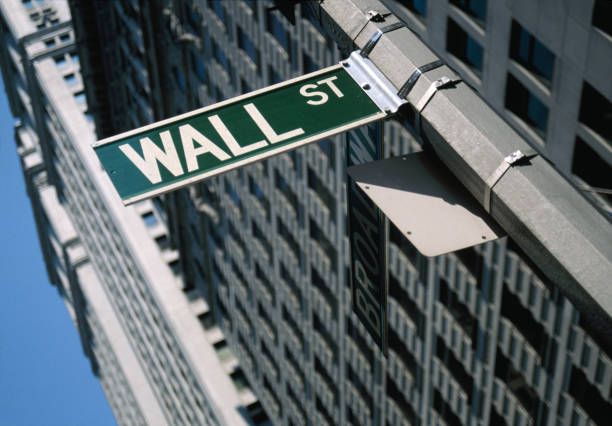 USA, New York, New York City, Lower Manhattan, 'Wall St' street sign,