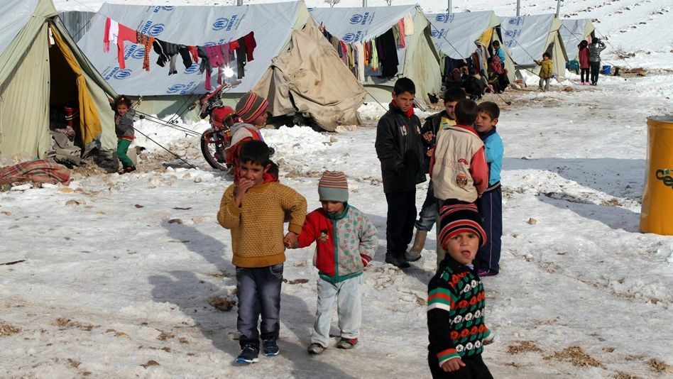 niños-migrantes-nieve-3