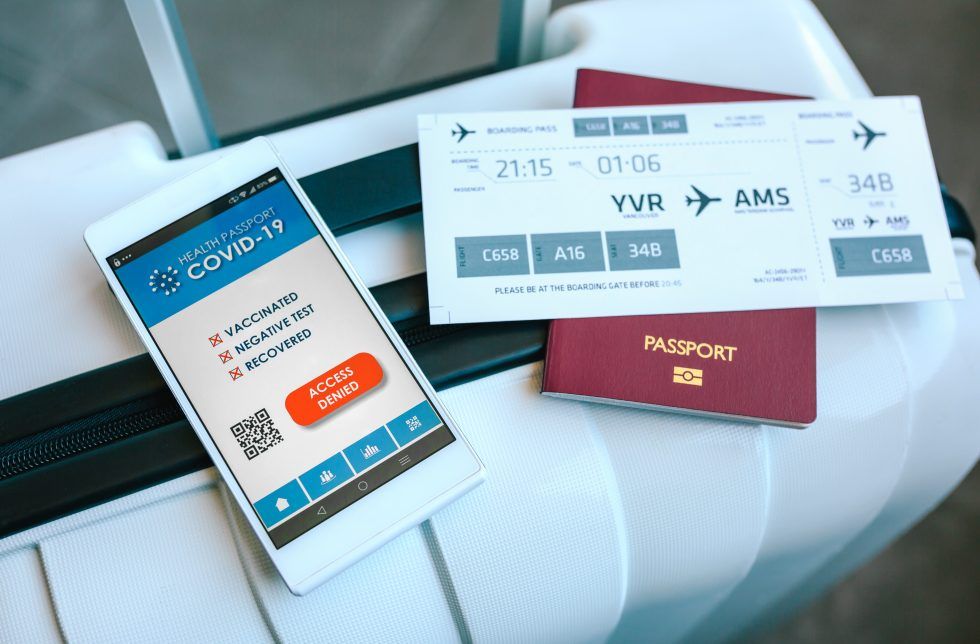 suitcase-with-passport-boarding-pass-and-denied-co-A98STNH-980x644